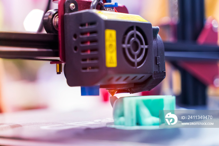 3D printer or additive manufacturing and robotic automation technology.