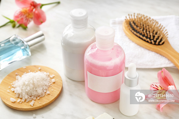 Different cosmetics for personal hygiene on white table