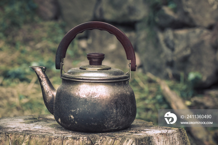 Vintage large aluminum tea pot kettle stove top isolated