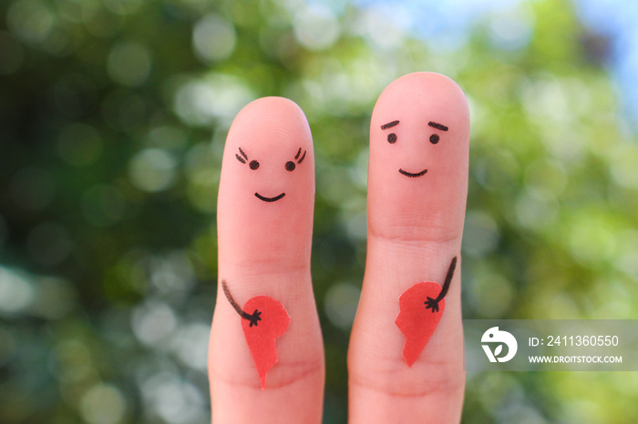 Fingers art of happy couple. Woman and man holding broken heart. Concept of joy after divorce.