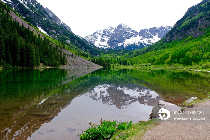 Snow Covered Mountains,  Lake and Reflection.  Maroon Bells near Aspen and Snowmass Village, Colorado, USA.