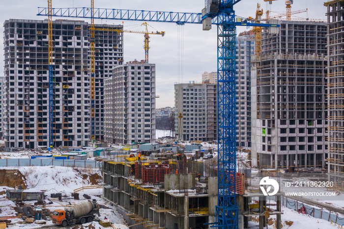 A large construction site with a lot of houses under construction