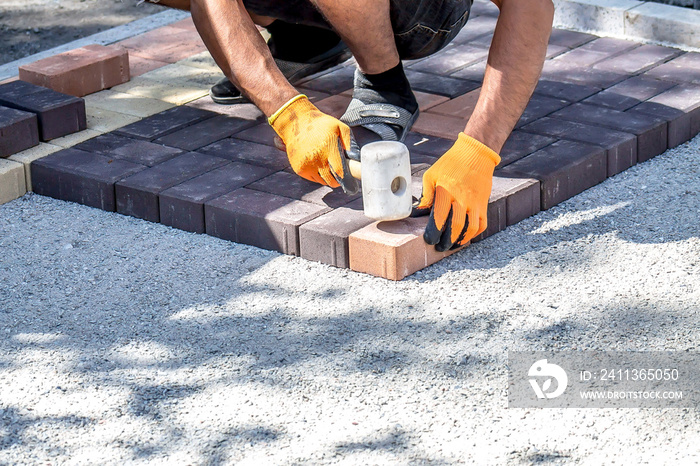 laying of paving slabs