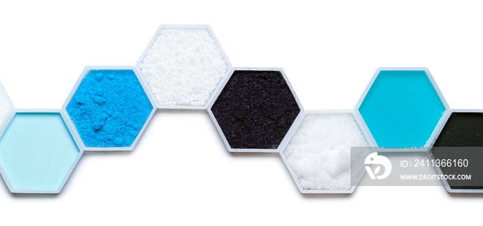 Chemical ingredient in hexagonal molecular shaped container. Hair Conditioner, Copper (II) Sulfate, Urea, Potassium permanganate, Sodium Hydroxide Pellets, Shampoo Liquid and Carbon Charcoal Powder.