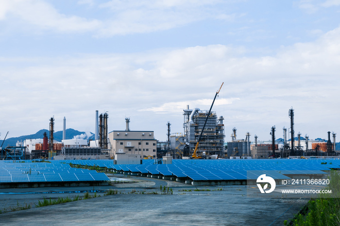 industrial buildings and solar panels. renewable energy concept.