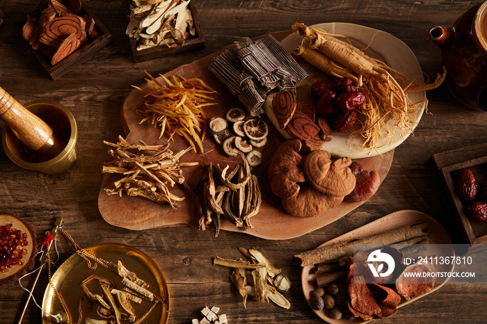 Close view of chinese traditional herb ginseng mushroom in wooden table