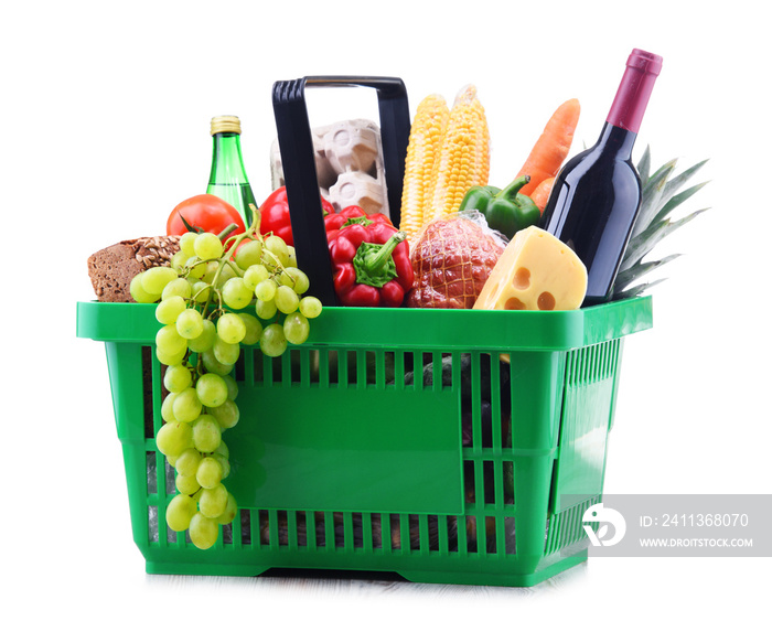 Plastic shopping basket with assorted grocery products