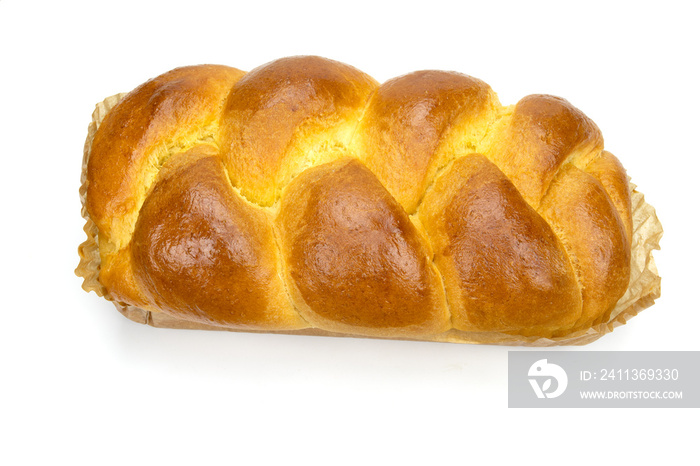 brioche entière au beurre isolé sur un fond blanc