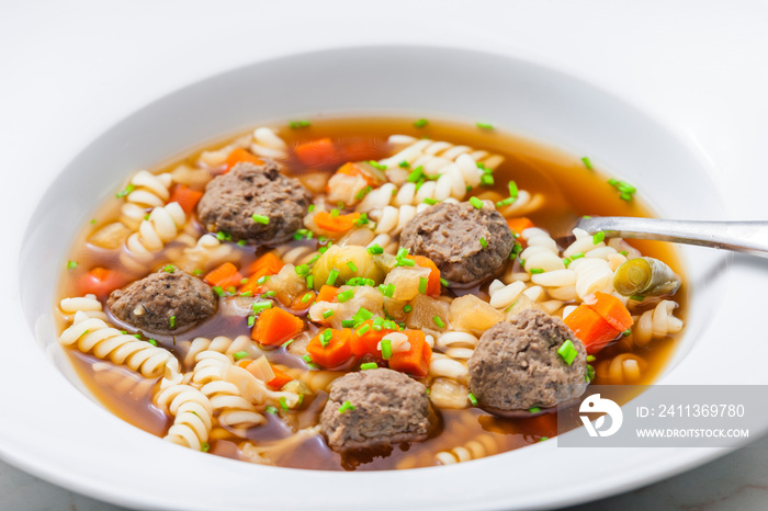 broth with liver dumplings, carrot and pasta