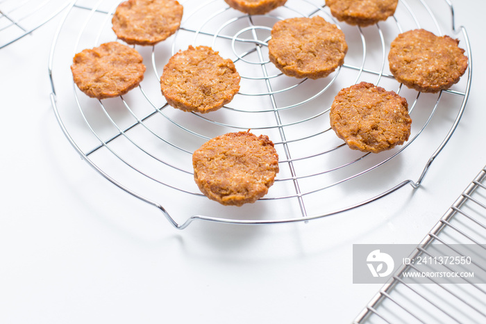 uncooked cookies on rack