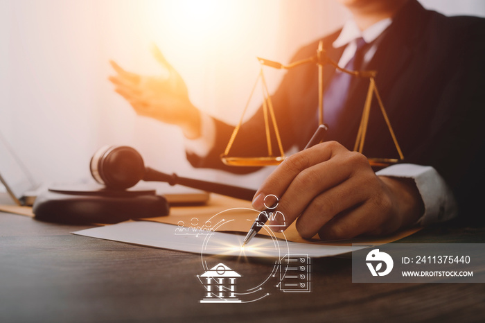 Male lawyer working with contract papers and wooden gavel on tabel in courtroom. justice and law ,attorney, court judge, concept.