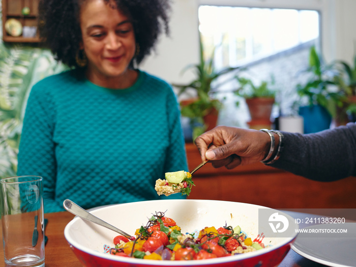 Couple eating lunch at home