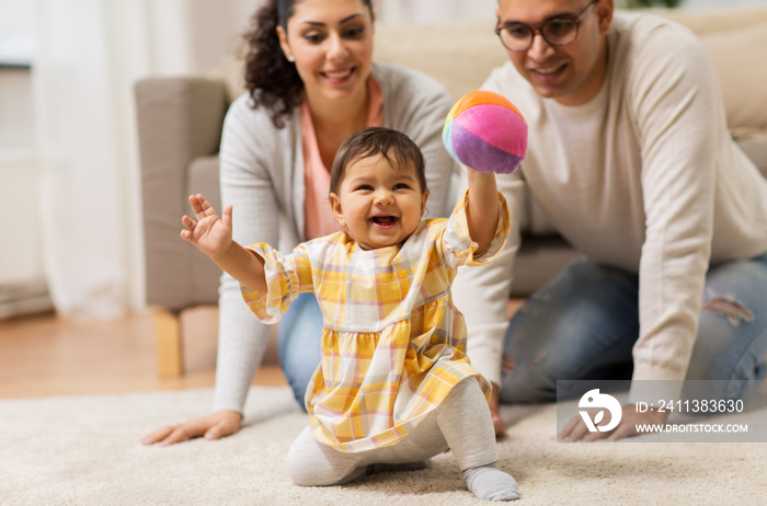 happy family and baby daugter playing at home