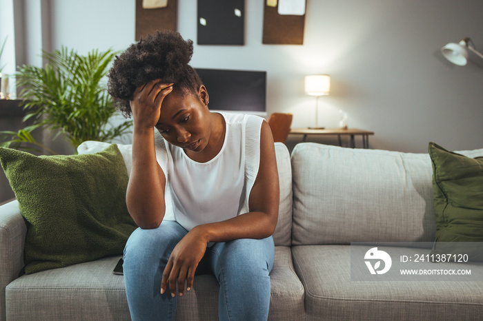 Sad young black woman portrait feeling negative emotions. Young girl in trouble feeling sad and depressed. Depressed African American Girl With Sad Emotions And Feelings