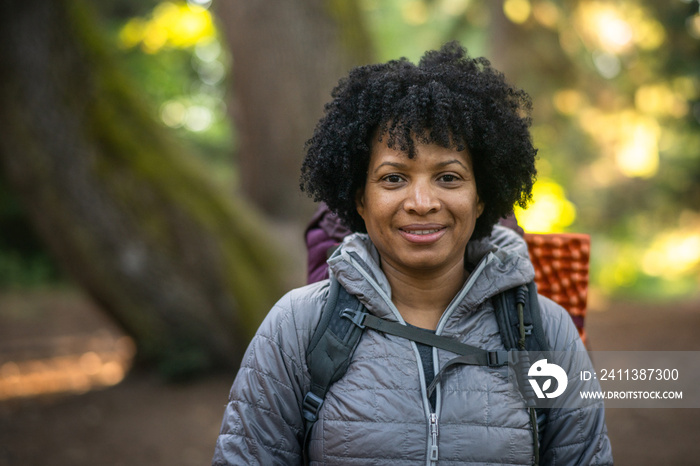 U.S. Army female soldier putting in the miles with an early morning hike in the NorthWest.