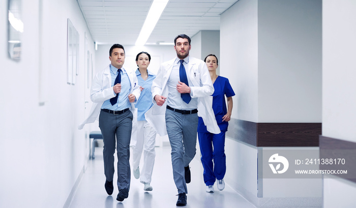 group of medics walking along hospital