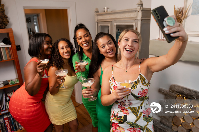 Women taking selfie during party