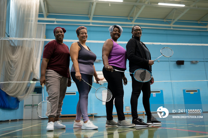 Portrait of women playing badminton