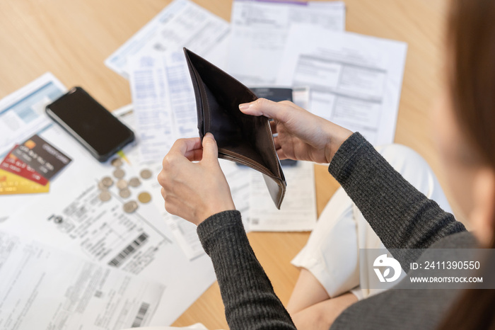 Stressed, Problem people asian woman, girl holding and open an empty wallet not have money, credit card, not to payment bill, loan or expense in pay. Bankruptcy, bankrupt and debt financial concept.