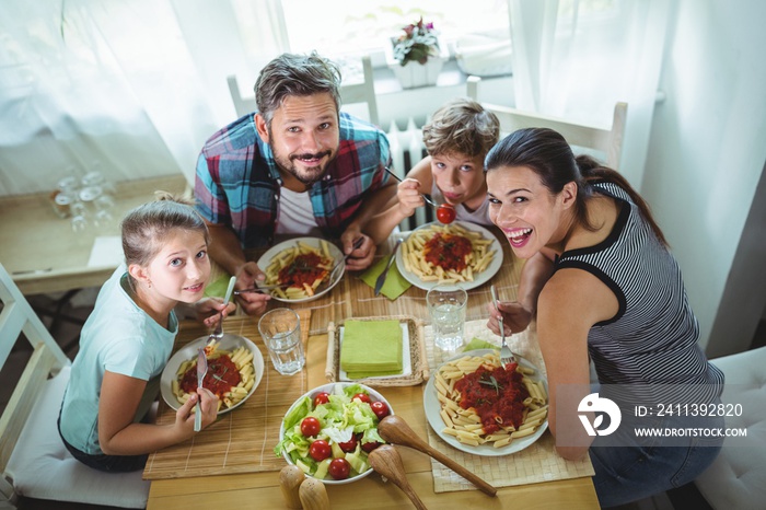 Elevated  view of family having meal together