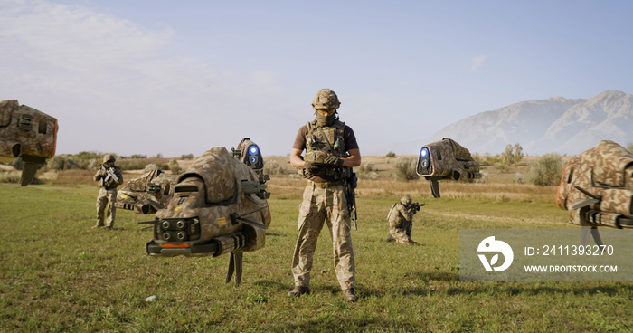 Military man launching drones in field