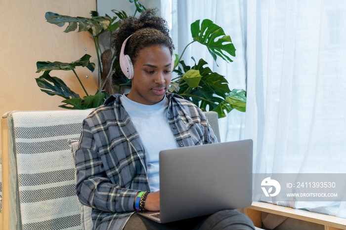 Young businesswoman during video call in office