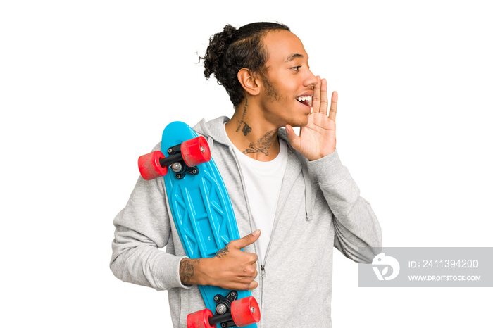 Young skater African American man isolated shouting and holding palm near opened mouth.