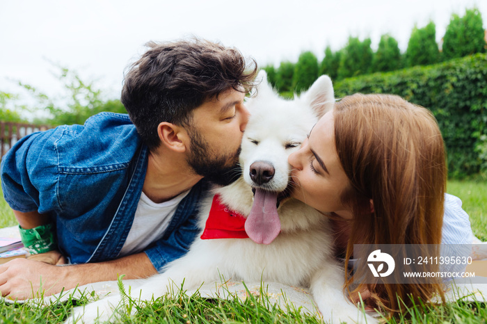 Weekend with girlfriend. Bearded man feeling relieved while spending his weekend with girlfriend and dog