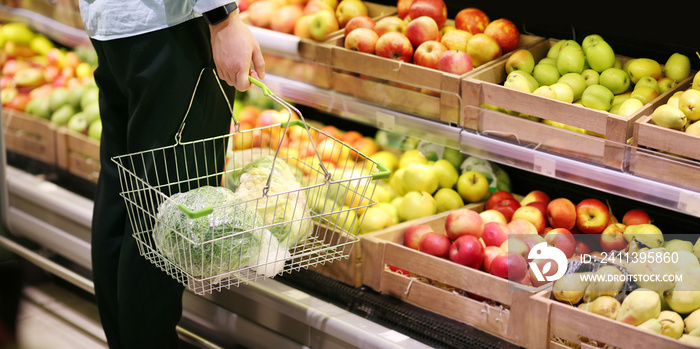 buying vegetables(cucumbers, tomatoes, onions, peppers, eggplant, zucchini) at the market