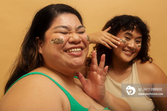 Asian female duo lifestyle studio portrait shot