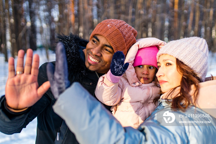 happiness excited people in warm clothing in winter outdoors