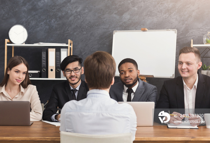 Human resources commission interviewing woman