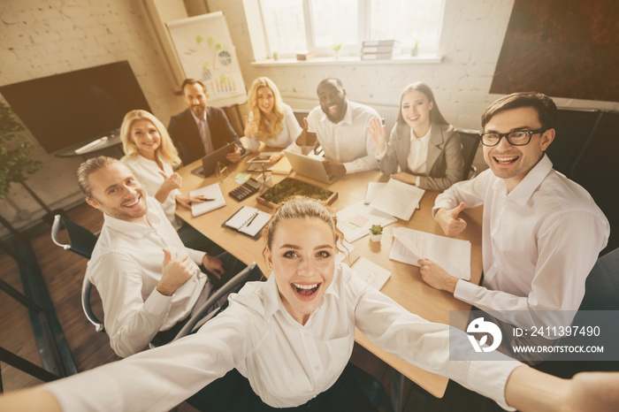 Photo of positive smart investors have gathering start-up growth plan training make selfie enjoy way-out crisis discussion in workplace workstation boardroom