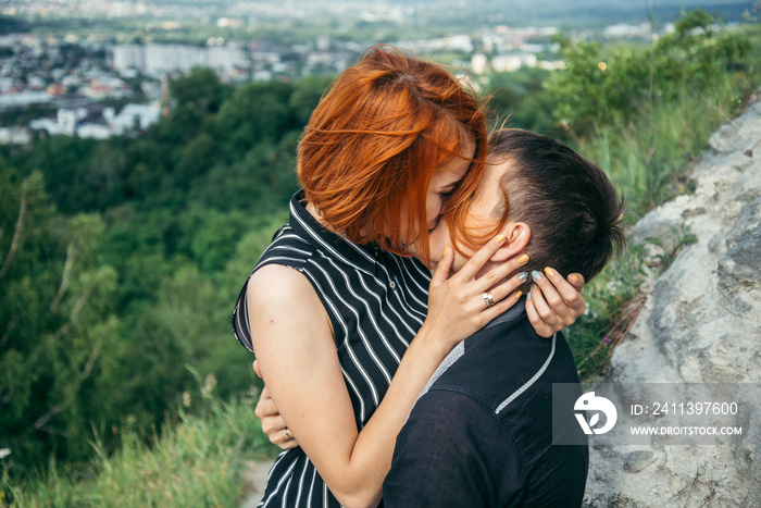 couple have a date on the peak of the hill