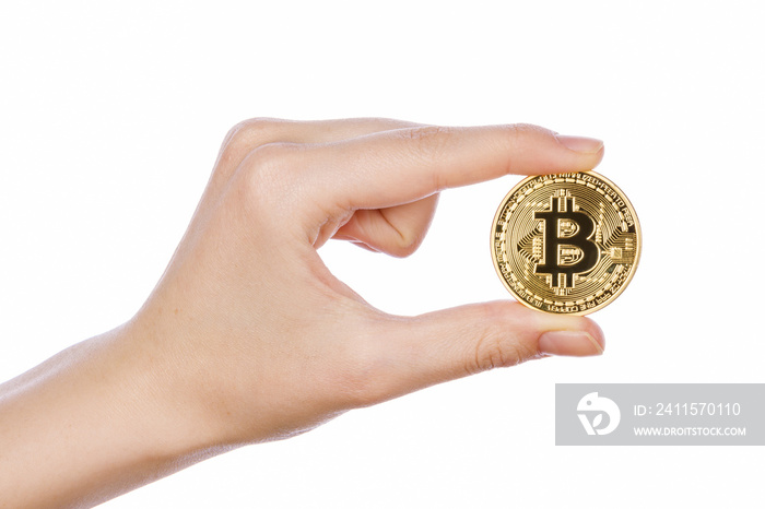 Young girl hand holding bitcoin on white