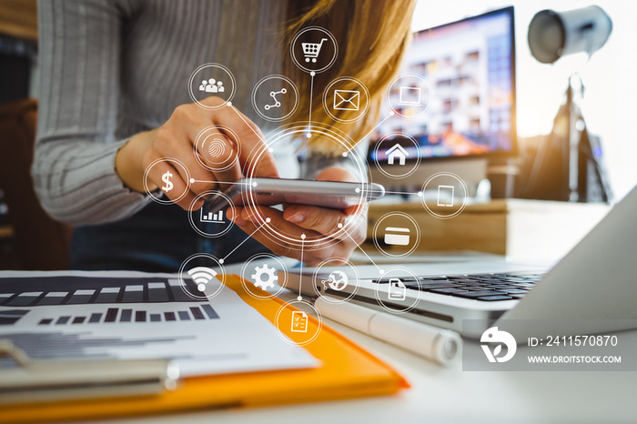 Close up of hand using tablet ,laptop, and holding mobile phone with credit card online banking paym