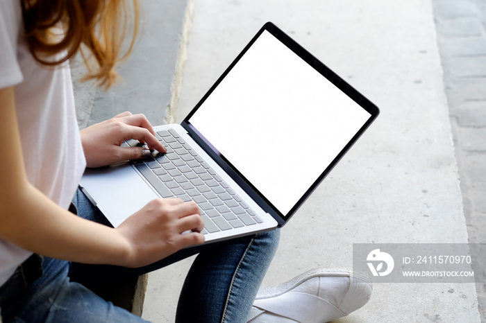 Cropped shot of student girl working on laptop