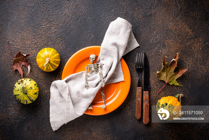 Halloween table setting with pumpkin