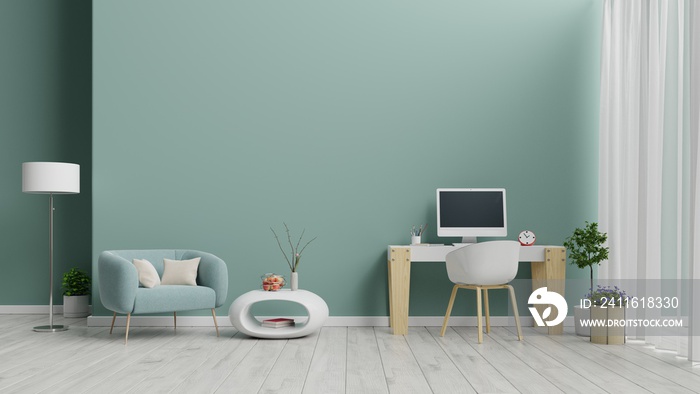 Office room with armchair and a green background.