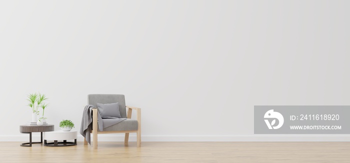 White wall with armchair in living room.