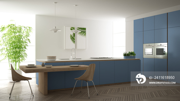 Modern clean contemporary blue kitchen, island and wooden dining table with chairs, bamboo and potte