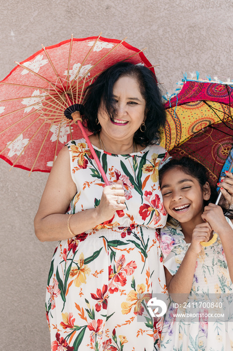 South Asian grandparent and granddaughter together