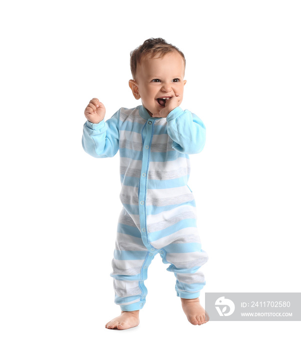 Little baby boy learning to walk on white background