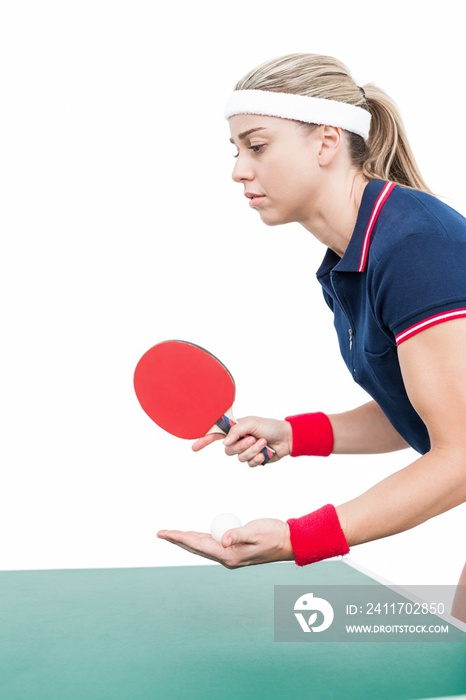 Female athlete playing ping pong