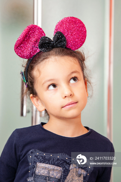 Portrait of a girl with carnival ears