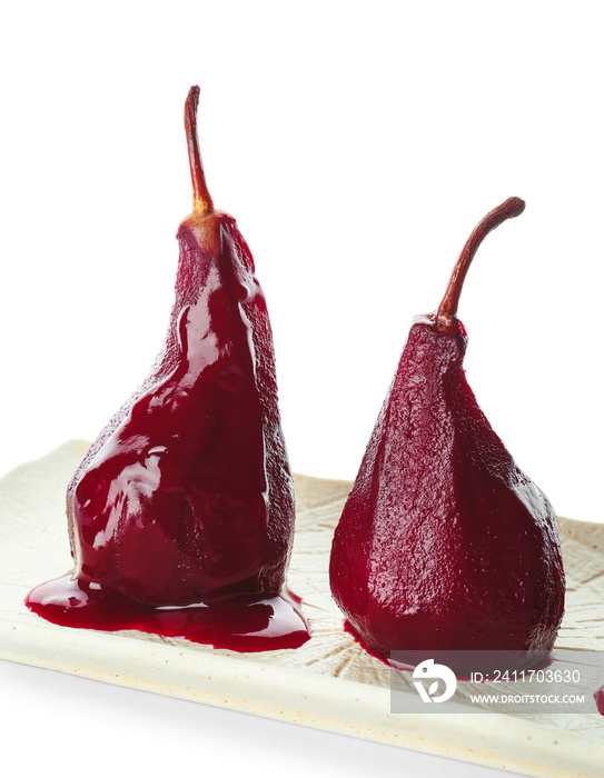 Plate of tasty poached pears in wine sauce on white background