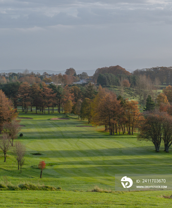 View of a golf course hole from the tee box.