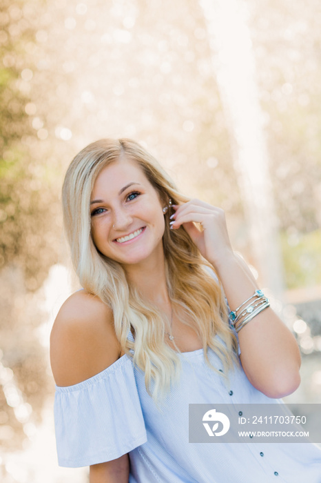 High School Senior Photo of Blonde Caucasian Girl Outdoors