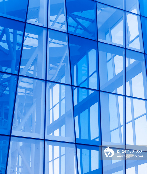 Abstract image of the glass facade of a modern building.