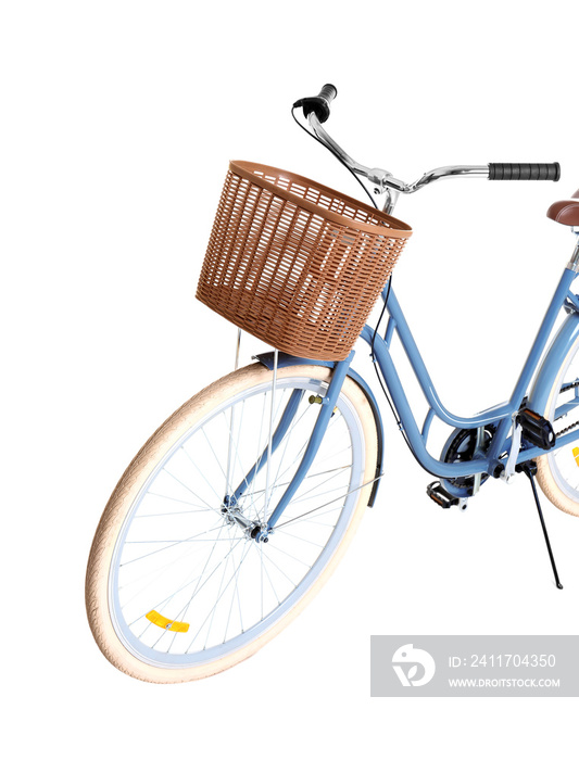 Bicycle with wicker basket on white background